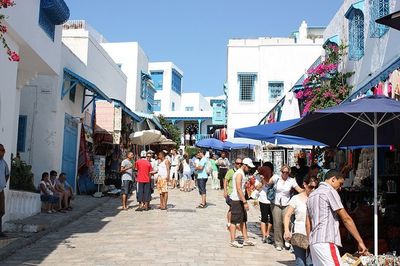 People walking on city street