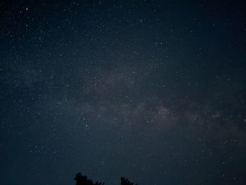 Low angle view of stars against sky at night