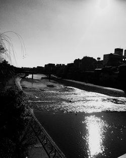 View of river with buildings in background