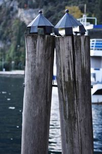 Close-up of wooden post in lake