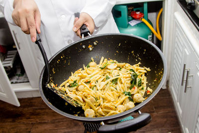 Person preparing food in kitchen