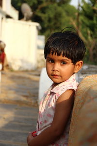 Portrait of girl standing outdoors