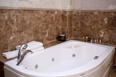 Close-up of faucet in bathroom