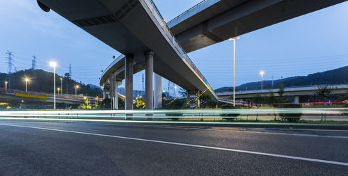 View of bridge over road against sky