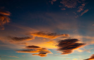 Low angle view of dramatic sky during sunset