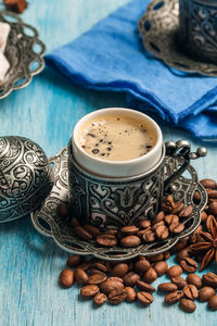 High angle view of coffee cup on table