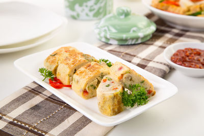 Close-up of food served in plate on table