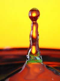 Close-up of water splashing in glass