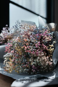 Close-up of purple flowers on table