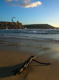 Scenic view of beach against sky