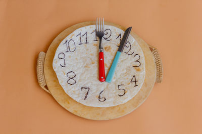 Directly above shot of clock on wall