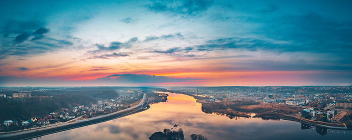 High angle view of buildings against sky during sunset