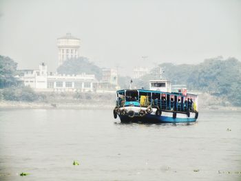 View of ship in water against clear sky