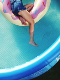 Boy playing in swimming pool