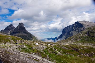 Landscape against rocky mountains