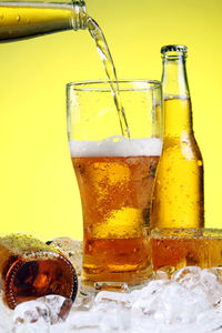 Close-up of beer glass on table