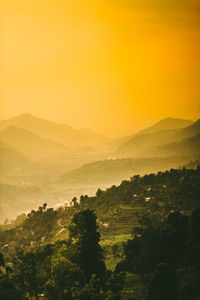 Scenic view of landscape against sky during sunset