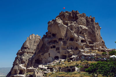 Old town of uchisar in turkey houses and the fortress in the summer in sunny weather