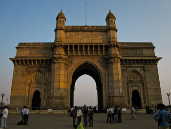 Group of people in front of historical building