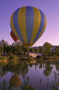 Low angle view of hot air balloons against sky