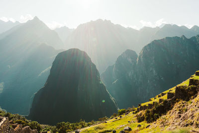 Machu picchu old inca ruins at sunrise in peru