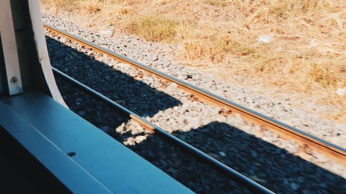 High angle view of railroad tracks by water