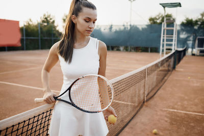 Young woman playing tennis