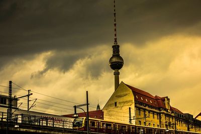 View of buildings against cloudy sky