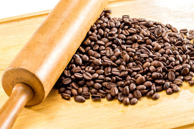Close-up of coffee beans on table