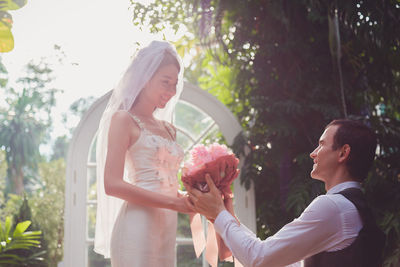 Close-up of couple standing outdoors