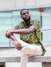 Portrait of young man looking away