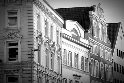 Low angle view of buildings against clear sky