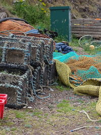 Stack of fishing net on field