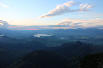 Scenic view of landscape against sky during sunset