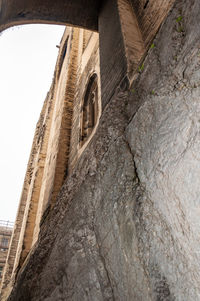 Low angle view of old building against sky