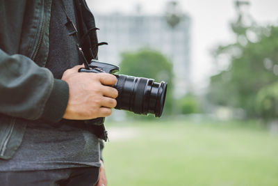 Man photographing camera