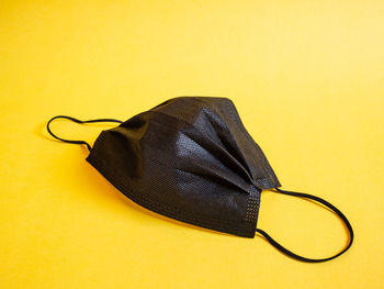 High angle view of camera over black background