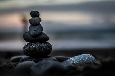 Close-up of stone stack on rock