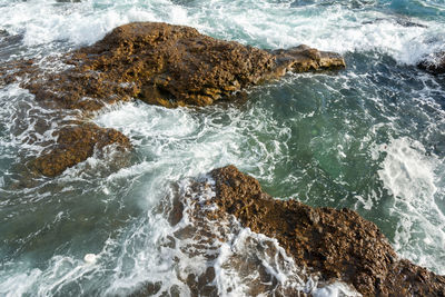 Scenic view of rocks on beach