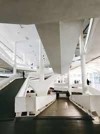 People walking in modern building