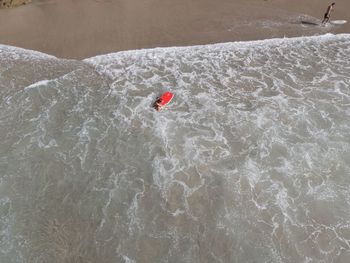 High angle view of person on sea shore