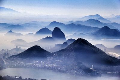 High angle view of calm lake against mountain ranges