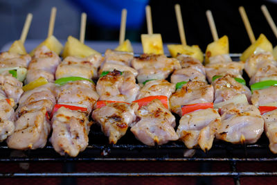 Close-up of meat on barbecue grill