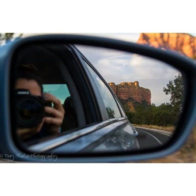 transportation, land vehicle, car, mode of transport, vehicle interior, side-view mirror, glass - material, car interior, reflection, travel, close-up, part of, sky, transparent, window, road, cropped, photography themes