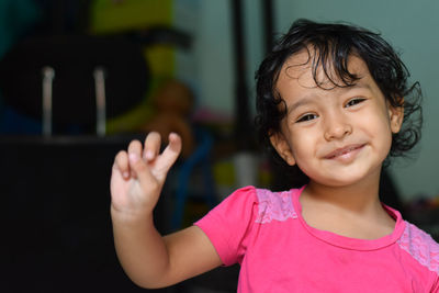 Portrait of cute girl smiling