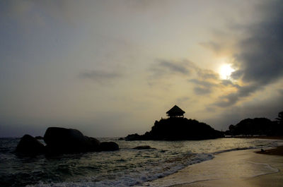 Scenic view of sea against sky at sunset