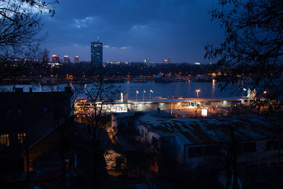 High angle view of illuminated buildings at night