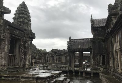 Old temple building against sky