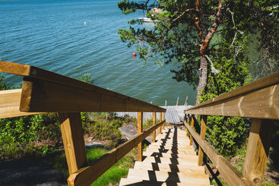 View of steps and railing to the sea 