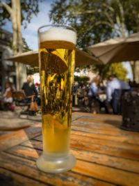 Close-up of beer glass on table